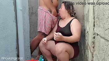 filipina caught bathing outside gets a deep chubby blowjob