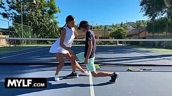Stepmother and stepson compete in a tennis tournament, showcasing their skills on the court.