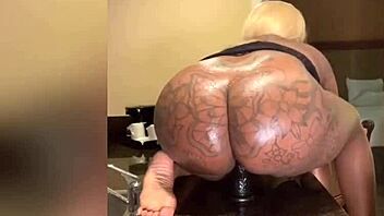 Blonde squirts on countertop with vibrator