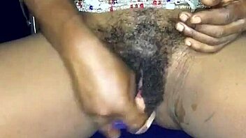 Watch this sexy ebony from Ghana satisfy herself with a dildo in her anal and pussy holes!