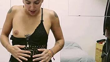 Tattooed Girl Rips Clothes Off in Teasing Striptease