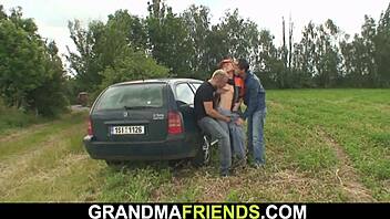 Old blonde gets a good fucking while sucking on another cock at the same time.