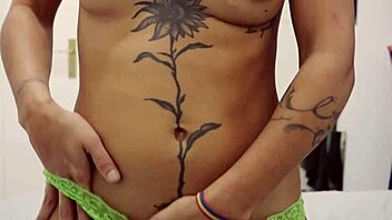 Tattooed Girl Rips Clothes Off in Teasing Striptease