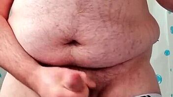 Chubby guy uses dildo and cums