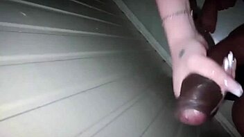 She massages the big black dick