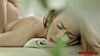 Ginger gets horny during her oiled massage, leads to blowjob