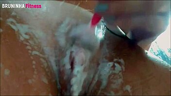 Redhead Brazilian beauty shows off her athletic body in a solo scene