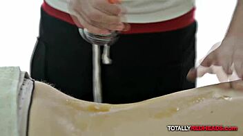 Ginger gets horny during her oiled massage, leads to blowjob