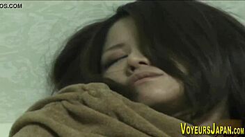 Hairy pussy Japanese babe fingers herself in solo action