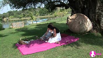 blonde and brunette babes in bold outdoor lesbian sex at the garden