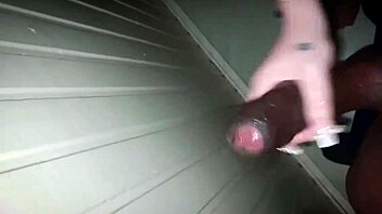 She massages the big black dick