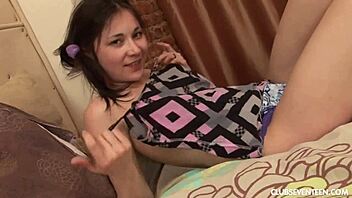 kinky brunette teen plays with toys in solo session