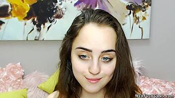 Pretty brunette beauty enjoys playing with sex toys