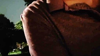 Risky handjob for a hot brunette at the bus stop.