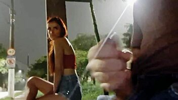 Risky handjob for a hot brunette at the bus stop.