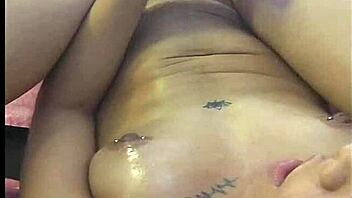 A young teen secretly masturbates and spills cream everywhere