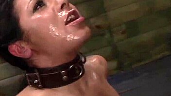 lesbian domme ties up sub and uses strapon for domination