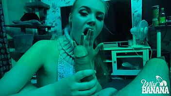 A Scandinavian man enjoys a banana and gives a blowjob in the dark