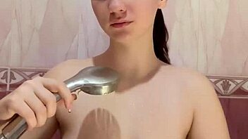 Student With Big Breasts Takes A Shower And Plays With Her Small 18+ Pussy