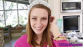 The petite teen 18+ takes a monster cock in doggystyle, getting a handjob before spraying cum all over.