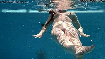 Nicole Pearl is very hot and horny and she is shaking her ass in the pool