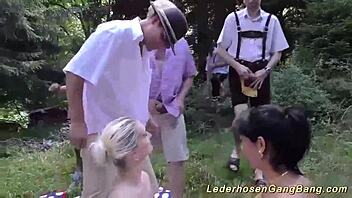 A hot and wild outdoor group sex party with facial finish