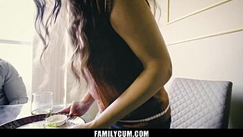 Teen sneaks under table to suck stepdad's cock. Familycum captures every moment.