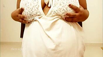 An Indian maid who is not slim shows her breasts