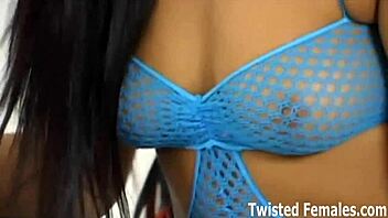 Mistress Dominates Bound Submissive in BDSM Spanking Session.