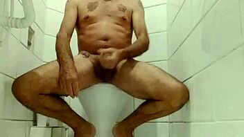 Sensual gay encounter unfolds in intimate setting