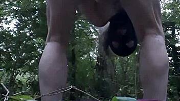 Slave girl pleasures herself outdoors in the forest on August 14, 2023.