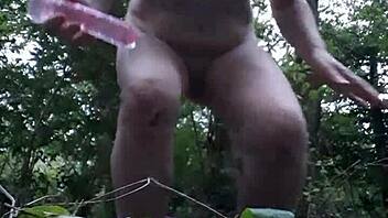 Slave girl pleasures herself outdoors in the forest on August 14, 2023.