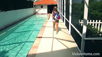 Watch busty blonde Vicky Vette finger her cunt while playing with her tits at the pool party