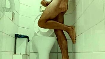 Sensual gay encounter unfolds in intimate setting