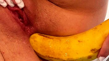 Maddy Nelson stuffs her ass with a banana