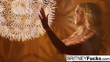 Blonde babe performs a retro tease in solo scene