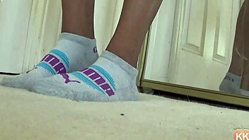I have a fetish for Puma socks on this ebony cougar's feet and ass