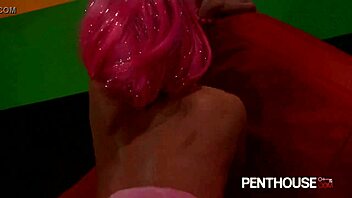 Kiera King fucks passionately in a pink skirt and wig, her boobs bouncing wildly.