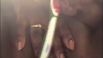 A black beauty gets a wet pussy creampie with a toothbrush