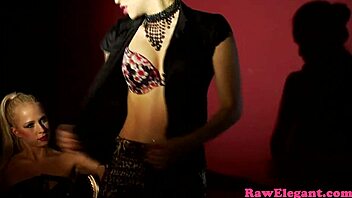 Glam latex lesbians toy each other