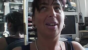 Momswithboys office scene with mature brunette.