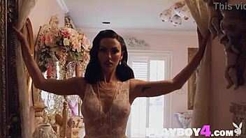 Beautiful big ass milf Bryona Hot poses seductively in stockings and lingerie.