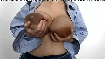 Natural big tits and hard nipples in a blue shirt