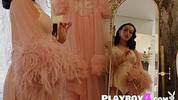 Beautiful big ass milf Bryona Hot poses seductively in stockings and lingerie.