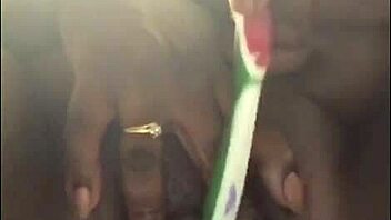 A black beauty gets a wet pussy creampie with a toothbrush