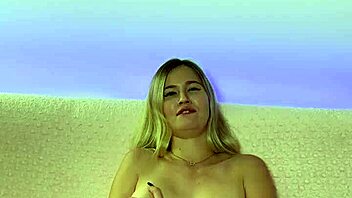 Sensual blonde strips and masturbates wildly