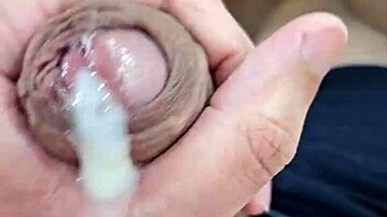 is this young guy doing a solo jerk off in his room?