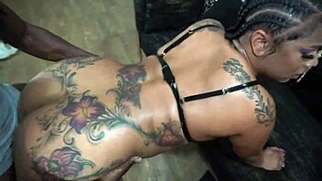 Porsha Carrera takes on a wild ebony gangbang with deepthroat action.