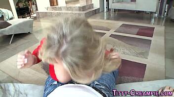 Busty babe in lingerie gives titfuck