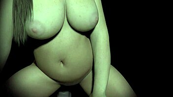 A beautiful girl with black hair enjoys riding a sex toy in the dark
